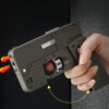 Folding Phone Pistol Gun Shell Throwing Bullet Toy