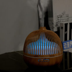 Ultrasonic Birdcage Wood Grain Aromatherapy Humidifier. The cool humidifier will make you relaxed and help to improve breathing and sleeping,